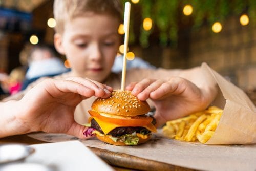 Child eating a burger