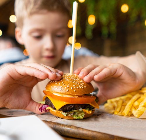 Child eating a burger