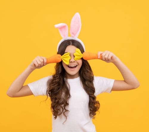 Easter kid with carrots
