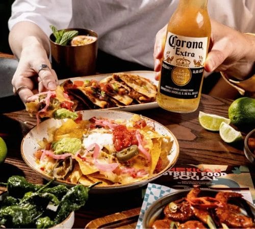 Las Iguanas nachos and corona beer